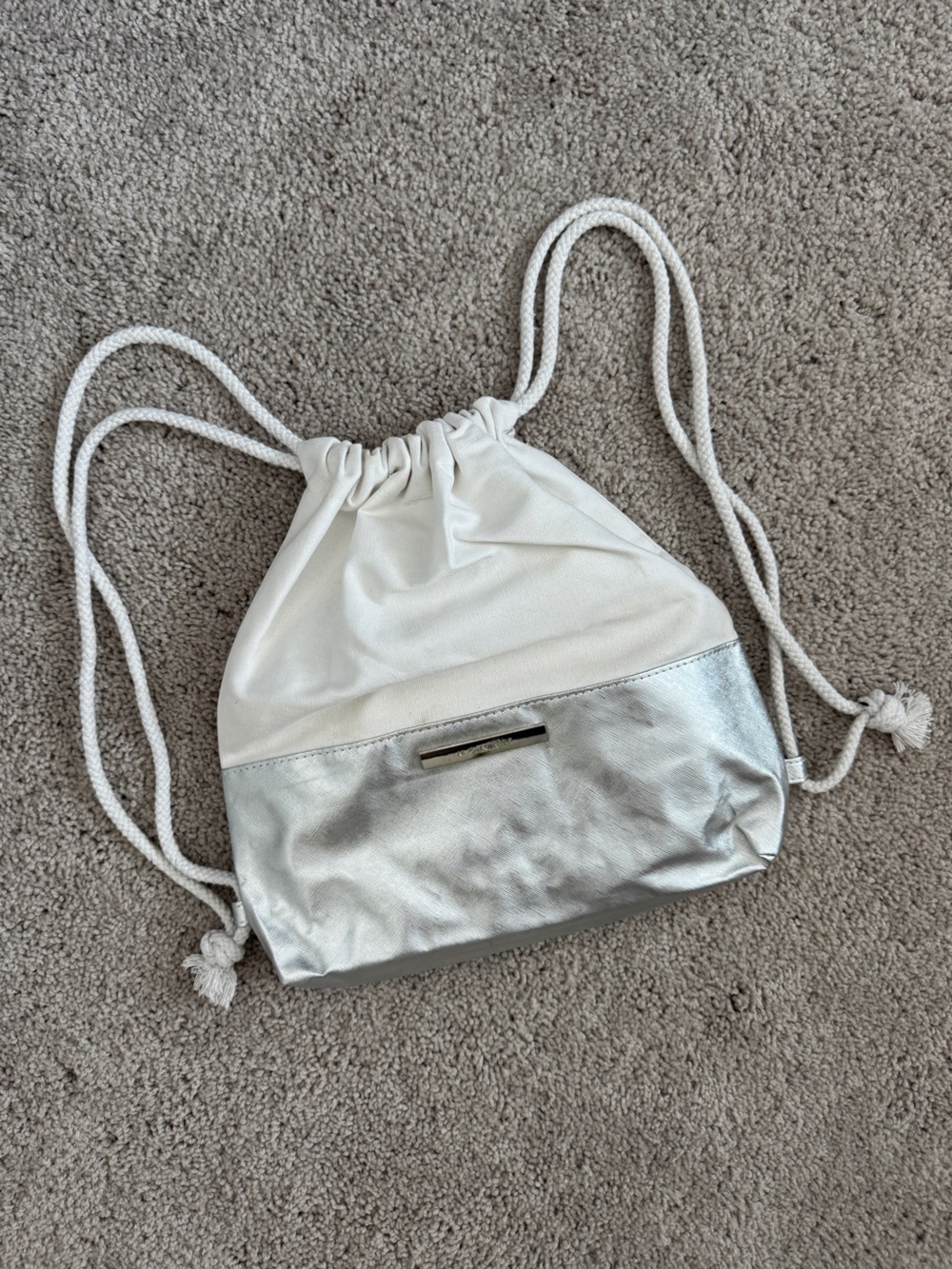 White and Silver MONAT Drawstring Crossbody Bag